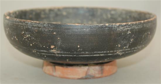 A Greek blackware rouletted bowl, Apulia c 4th century B.C., 17.5cm